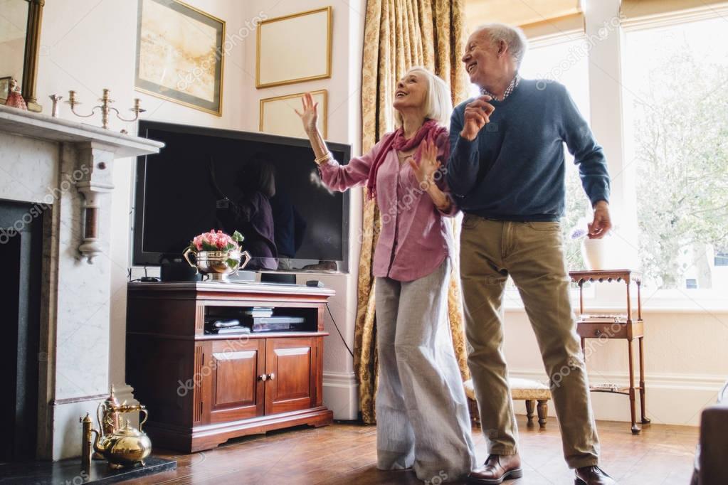 Seniors Dancing At Home