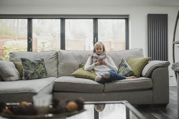 Woman Using Smartphone At Home — Stock Photo, Image