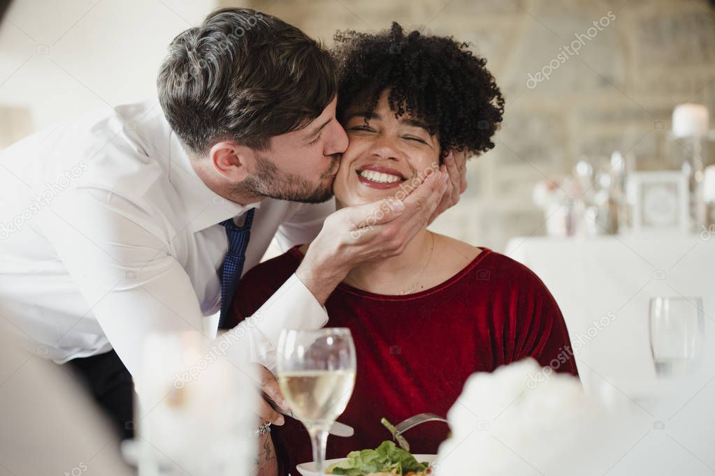 A Kiss On The Cheek At The Wedding Dinner