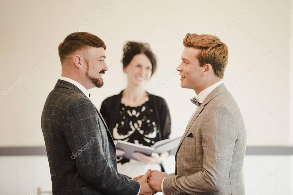 Two Men Exchanging Vows On Their Wedding Day