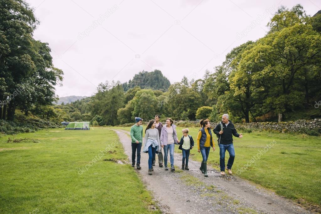 Family Going for a Hike After Camping