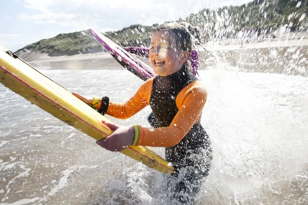 Splashing in the sea with Bodyboards — Stock Photo, Image