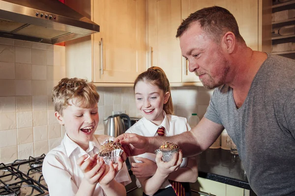 Mischevious Father Stealing some Cake — Stock Photo, Image