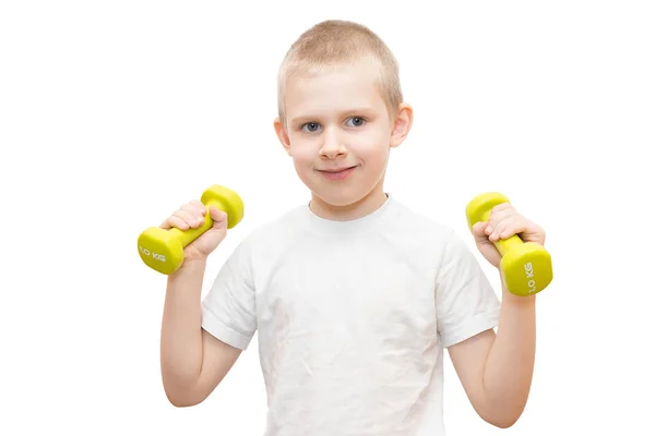 Boy with a dumbbell on a white background — Stock Photo, Image