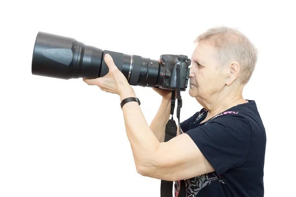 Pensioner with a camera — Stock Photo, Image
