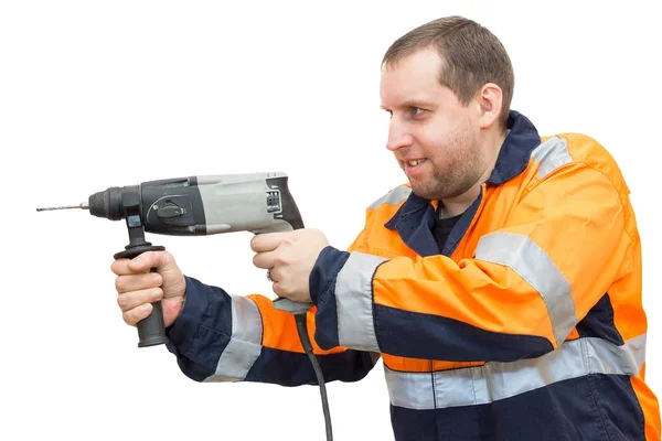 Man in overall met een hamer — Stockfoto