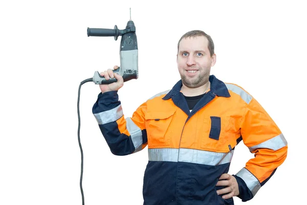 Man in overall met een hamer — Stockfoto