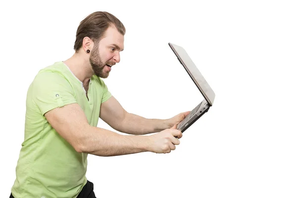 Uomo con un computer portatile su sfondo bianco — Foto Stock