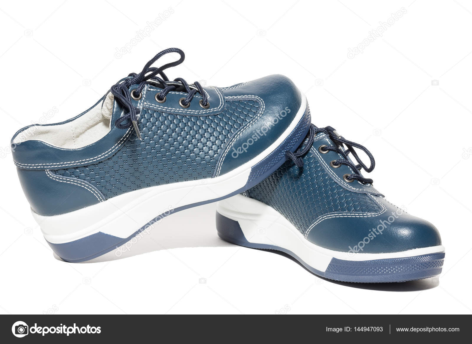 Shoes on a white background — Stock Photo © AlexBush 144947093