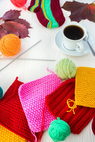 knitting with a mug of coffee