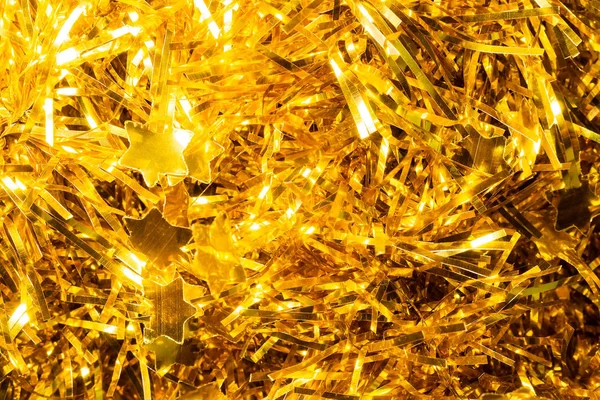 Christmas background gold tinsel — Stock Photo, Image