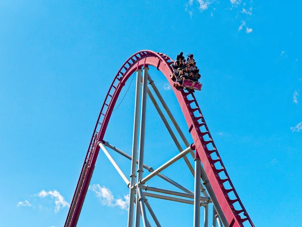 People having fun at roller coaster at Rainbow Magicland funfair — Stock Photo, Image