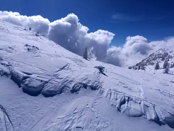 Avalanche clouds fake effect snow covered mountain