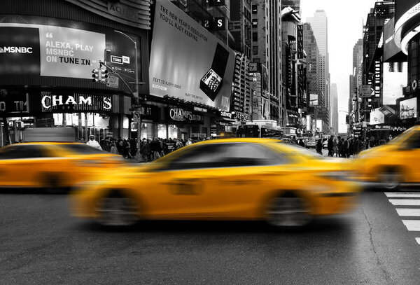 New York City, USA - April 2018: taxis in midtown Manhattan selective color