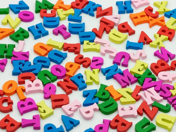 Heap of Colorful wooden letters on white background — 스톡 사진