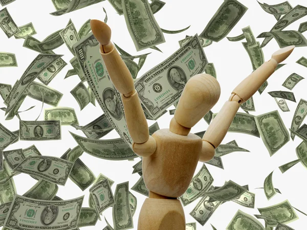 Houten etalagepop juichende handen omhoog onder regen van geld succes dollars geïsoleerd op wit — Stockfoto
