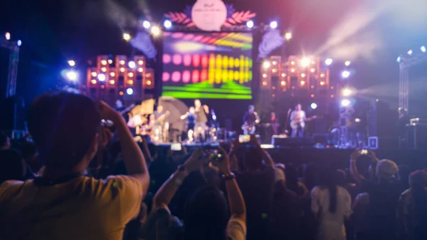 Silhouettes of concert crowd — Stock Photo, Image