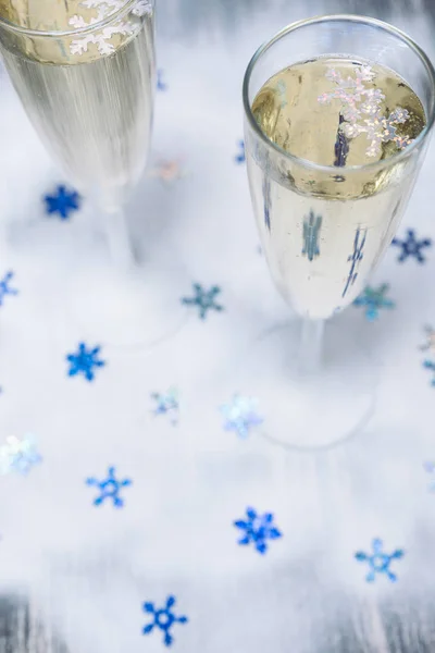 Christmas illuminations with champagne glass — Stock Photo, Image