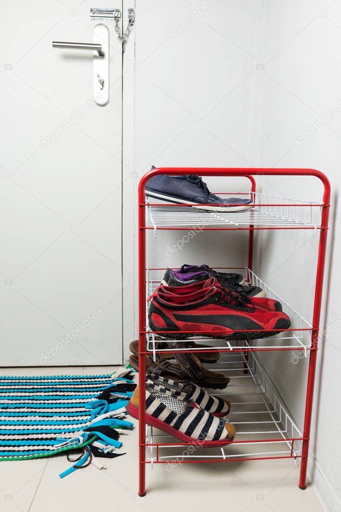  Metal red shelf with shoes