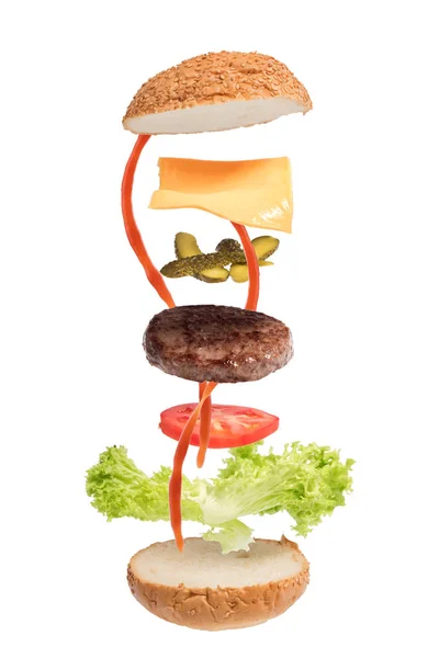 Big burger z latania składników. — Zdjęcie stockowe