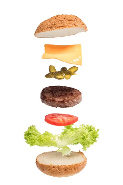 Malzemeler uçan ile büyük burger. 