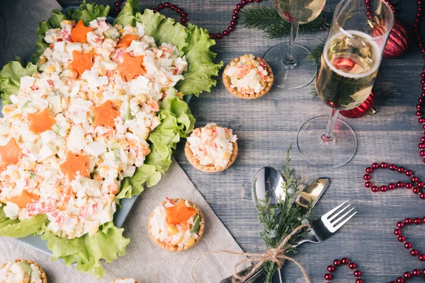 Crab salad tarts on wooden background. — Stock Photo, Image