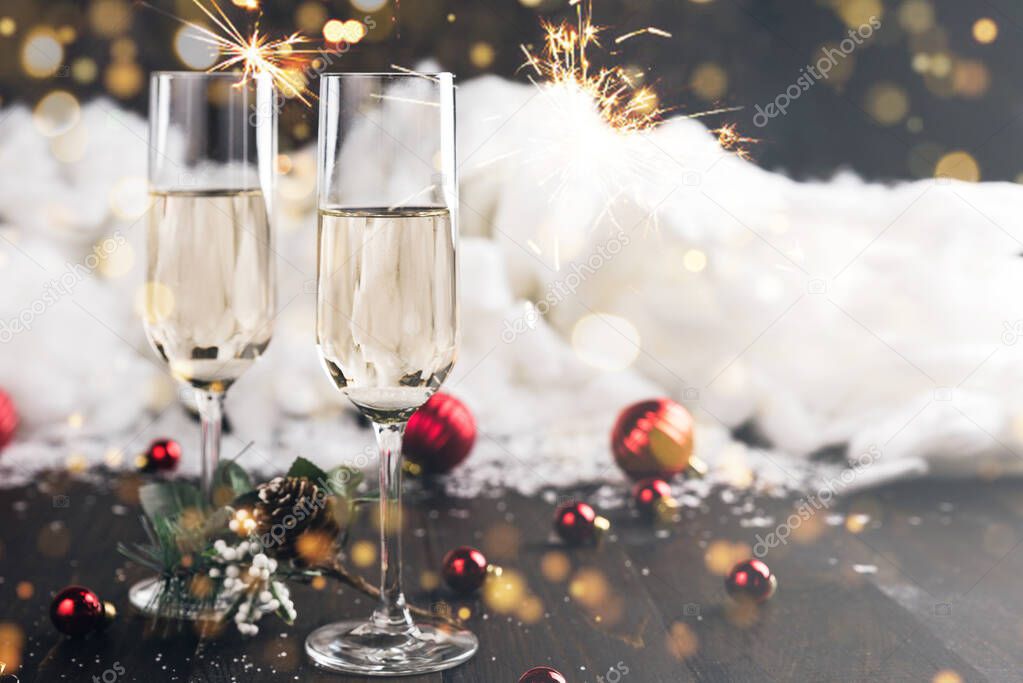 Christmas and New Year celebration with glasses of champagne