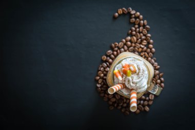 Pumpkin spice latte in glass jar clipart