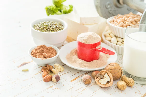 Selection vegan protein sources on wood background