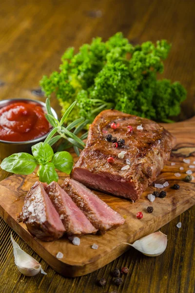 Beef steak with herbs and spices — Stock Photo, Image