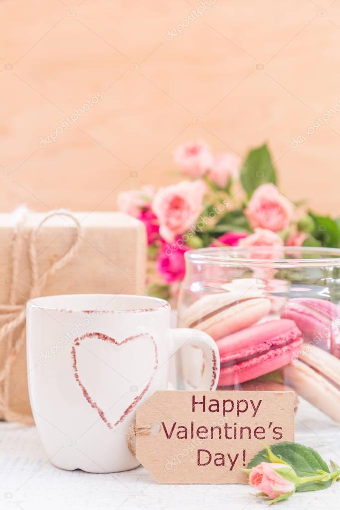 Morning coffee with flowers and macaroons. Mathers day Valentine concept.