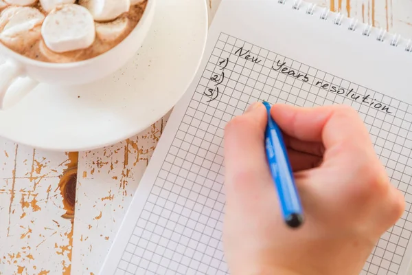 Making list of New Yearss resolutions — Stock Photo, Image