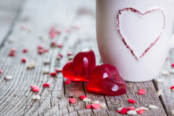 Valentines day concept - heart shaped sweets on rustic background — Stock Photo, Image