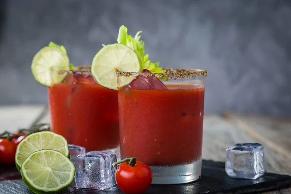 Bloody mary cocktail and ingredients — Stock Photo, Image