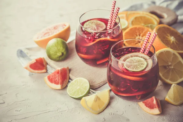 Sangria and ingredients in glasses — Stock Photo, Image