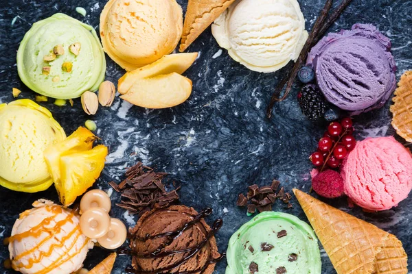 Selection of colorful ice cream scoops on marble background — Stock Photo, Image