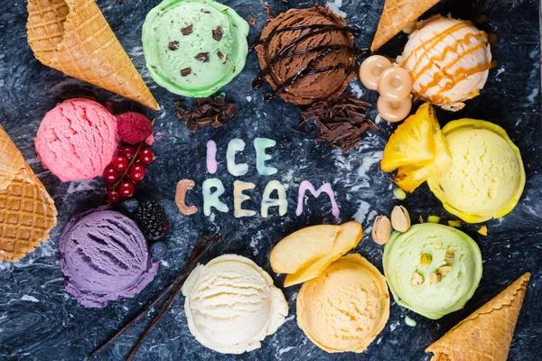 Selection of colorful ice cream scoops on marble background — Stock Photo, Image