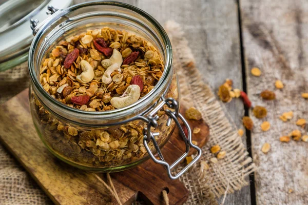 Granola in glass jar — Stock Photo, Image