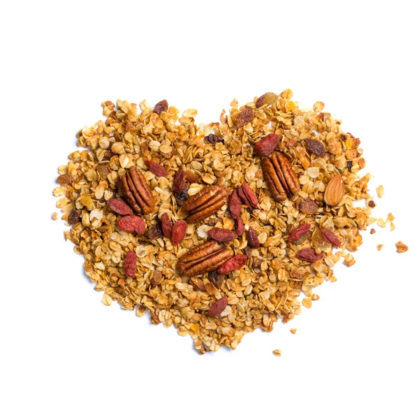 Sağlıklı beslenme kavramı - granola fındık ile kalp şeklinde