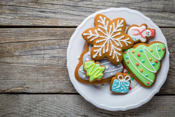Vánoční cukroví na rustikální dřevo pozadí — Stock fotografie