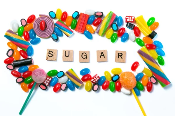 糖尿病概念-白色背景下的糖果选择 — 图库照片