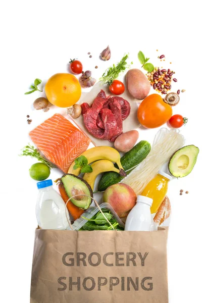 Grocery shopping concept. Balanced diet concept. Fresh foods with shopping bag on white background — Stock Photo, Image