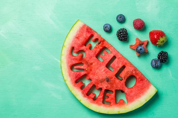 Hello summer concept - letters carved from watermelon