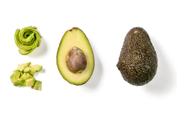 Slices of avocado on white background. Whole and half with leaves. Design element for product label — Stock Photo, Image