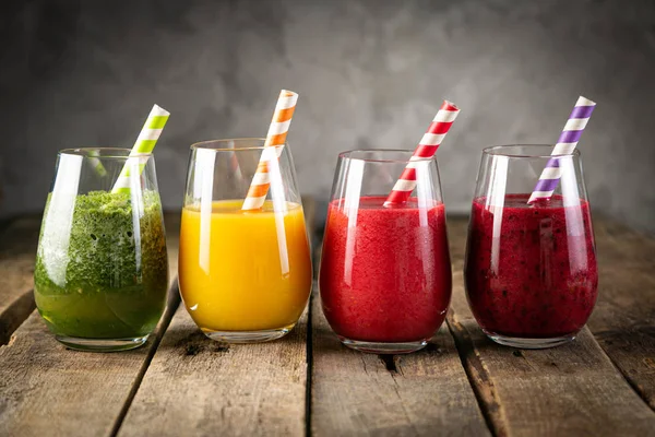 Selection of colorful smoothies in glasses — Stock Photo, Image