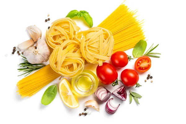 Italian cuisine concept - raw pasta and ingredients — Stock Photo, Image
