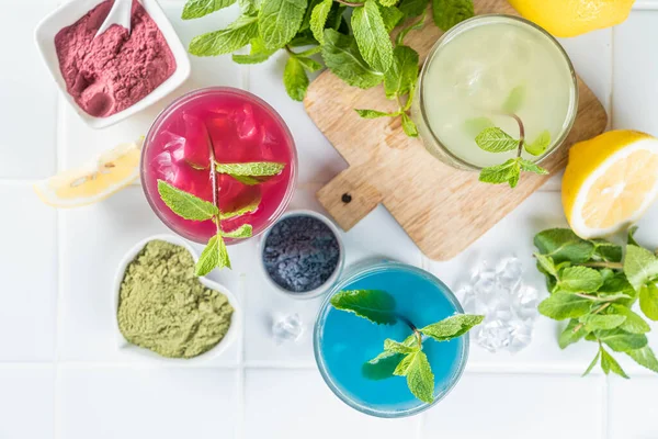 Selection of matcha lemonades - green, blue, red on white background — Stock Photo, Image