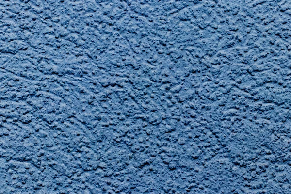 Textuur van een blauwe stenen muur. — Stockfoto