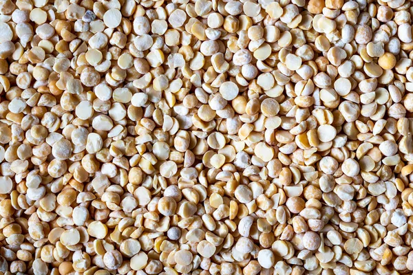 エンドウ豆の種の背景を閉じます。ヘルシーなベジタリアンフード. — ストック写真