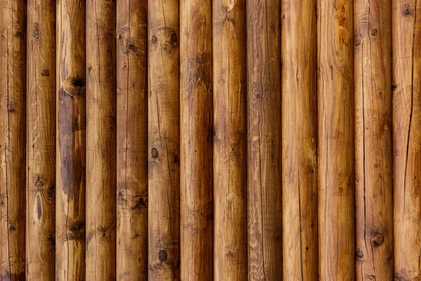 Wooden wall from logs as a background. — Stock Photo, Image